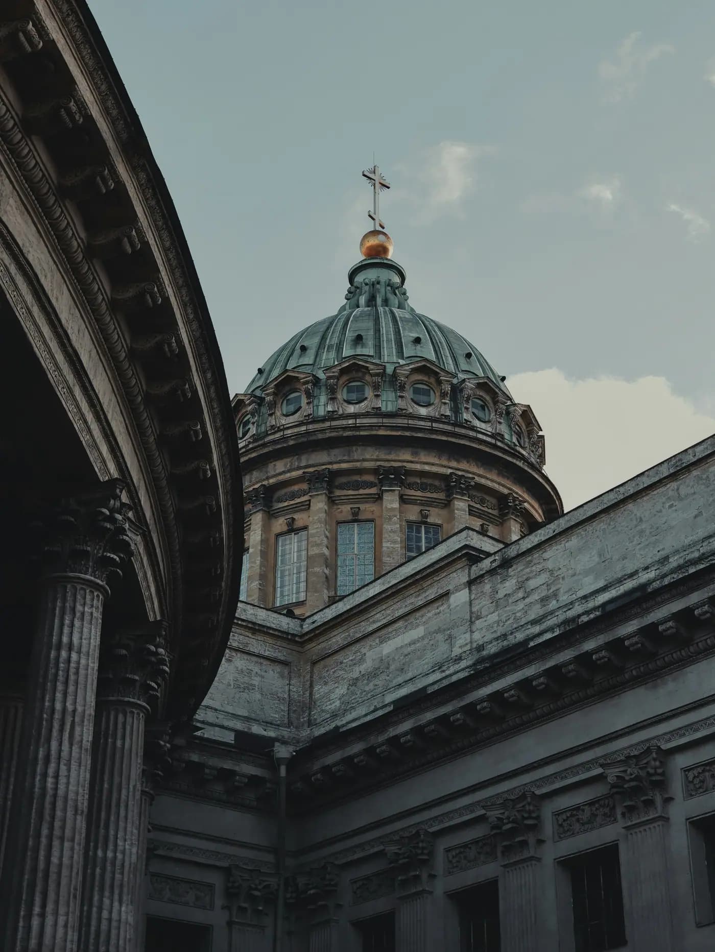 Architectural dome framed by historic columns.